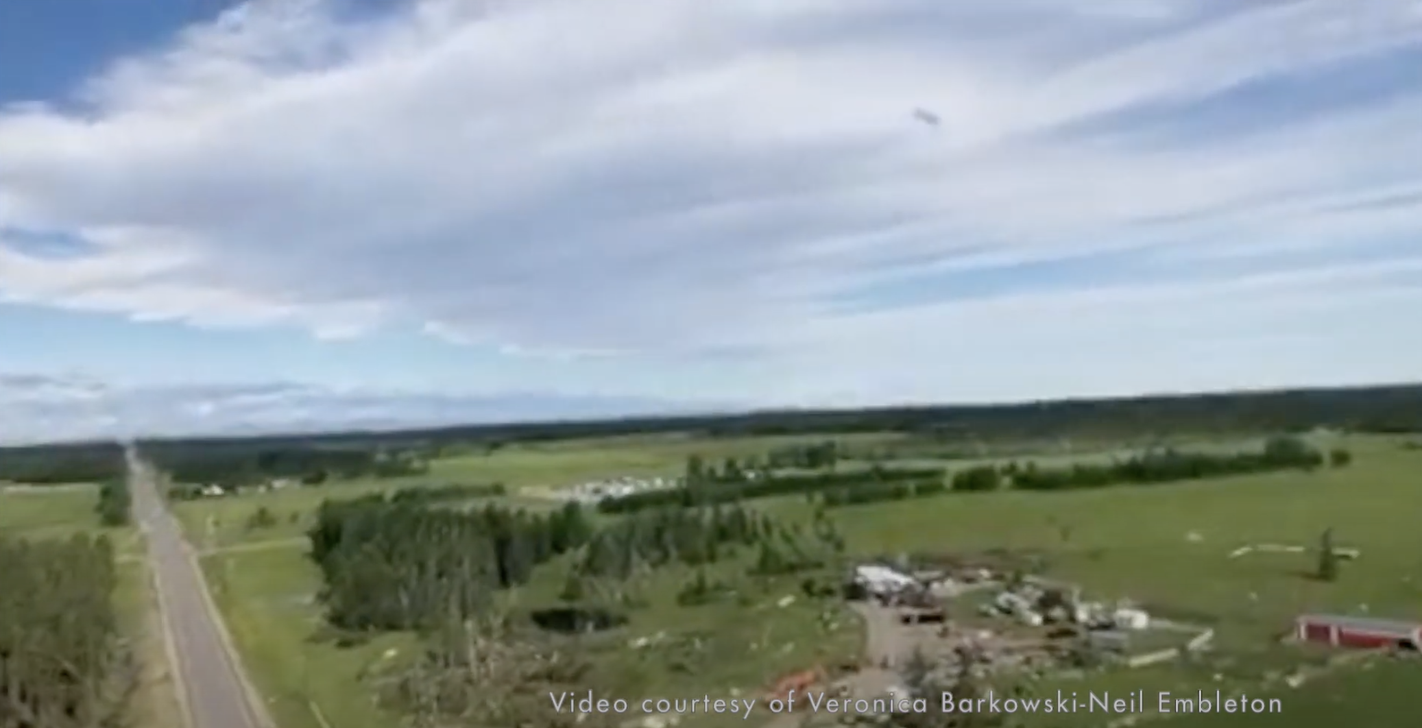 Woman captures scope of Sundre tornado damage from helicopter